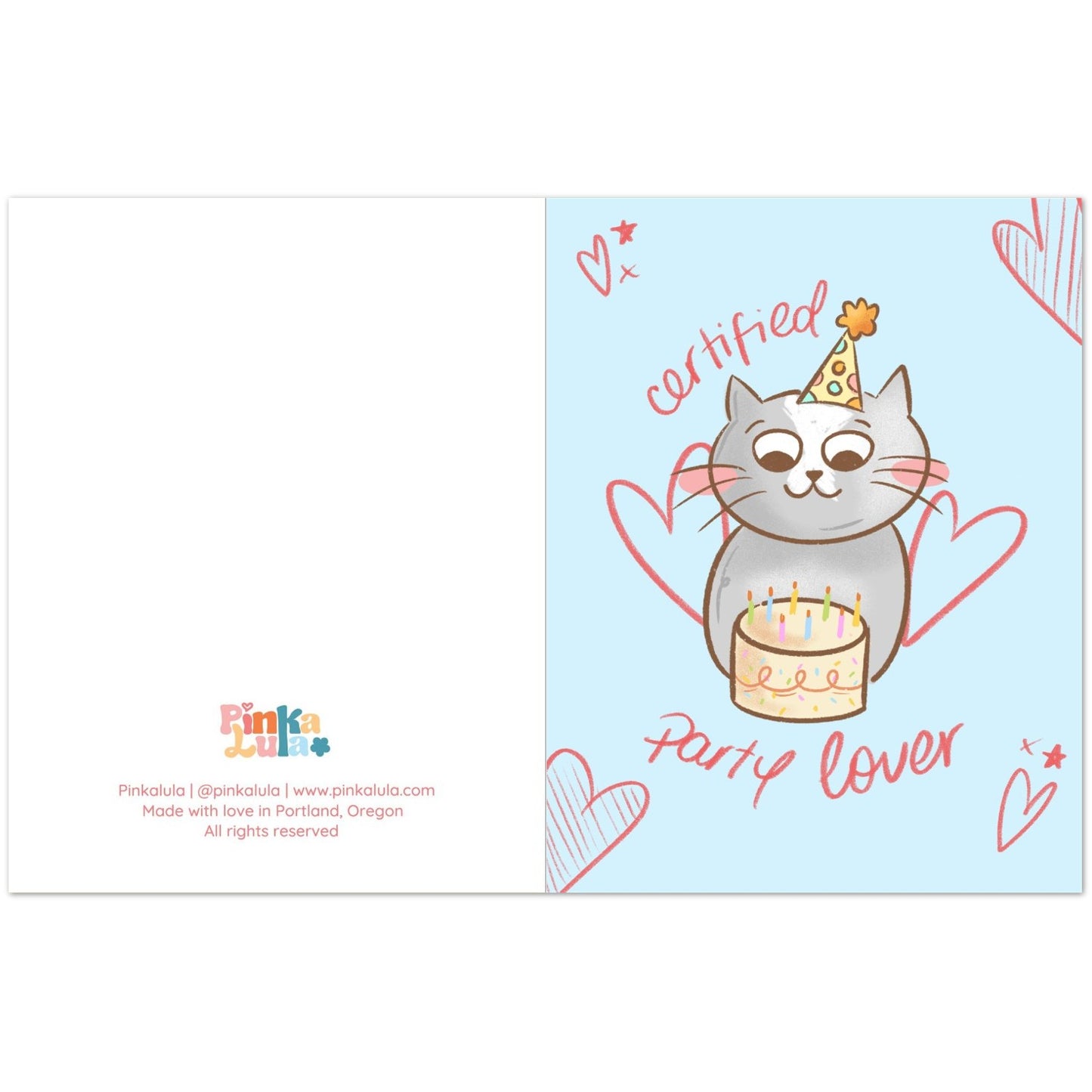 A folded greeting card shown open, with a white left panel and a light blue right panel. The right panel features a cartoon gray cat wearing a party hat and holding a birthday cake, surrounded by pink hearts and the words 'certified' and 'party lover.