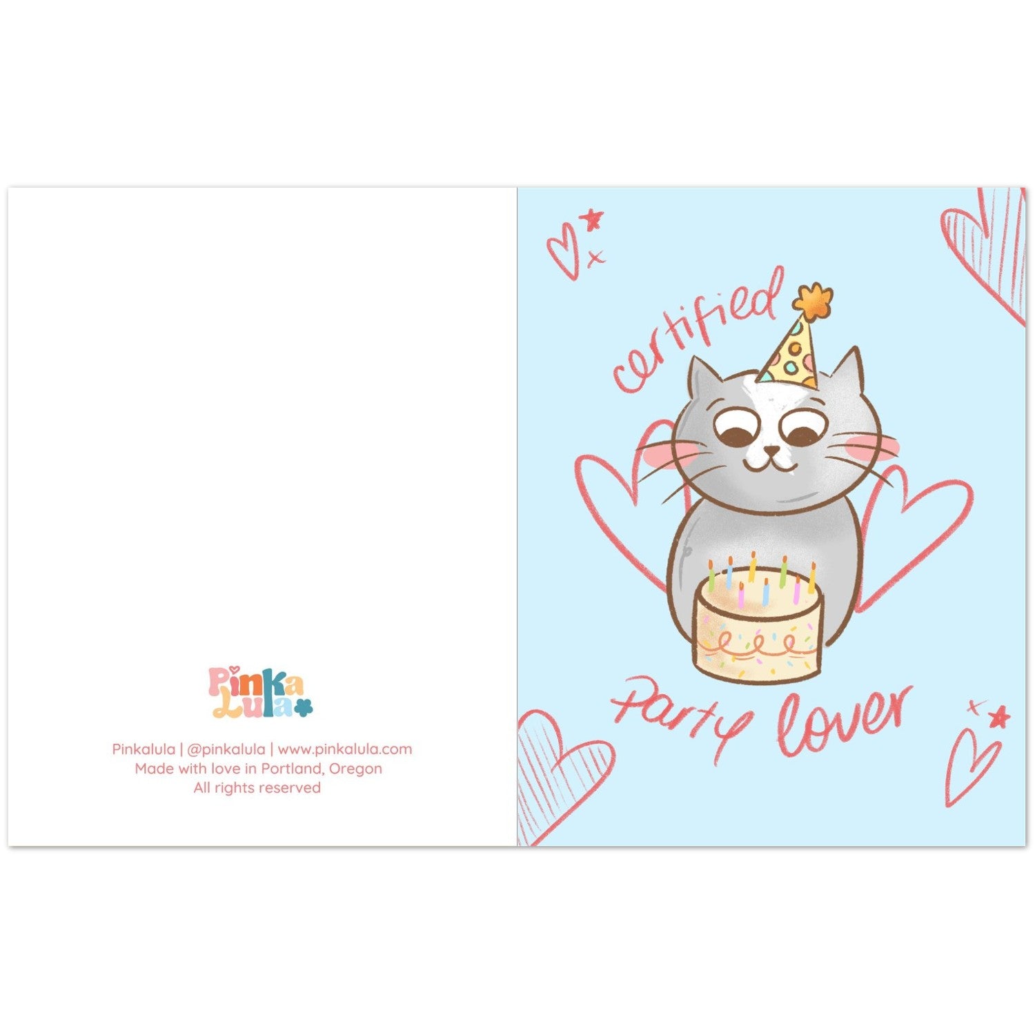 A folded greeting card shown open, with a white left panel and a light blue right panel. The right panel features a cartoon gray cat wearing a party hat and holding a birthday cake, surrounded by pink hearts and the words 'certified' and 'party lover.